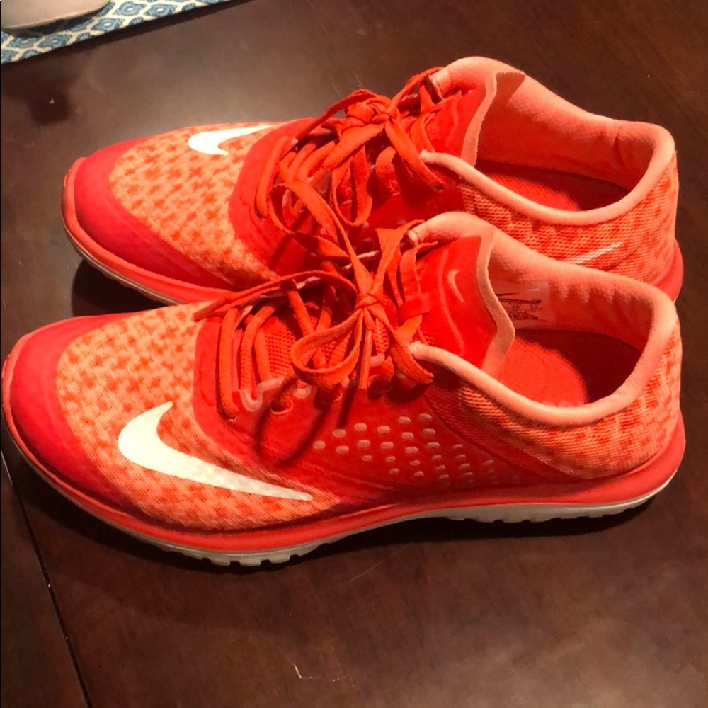 Lightly worn orange Nike